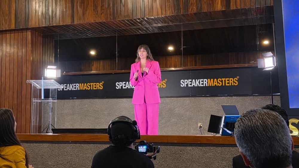 Alejandra Endara speaking on stage at SpeakerMasters